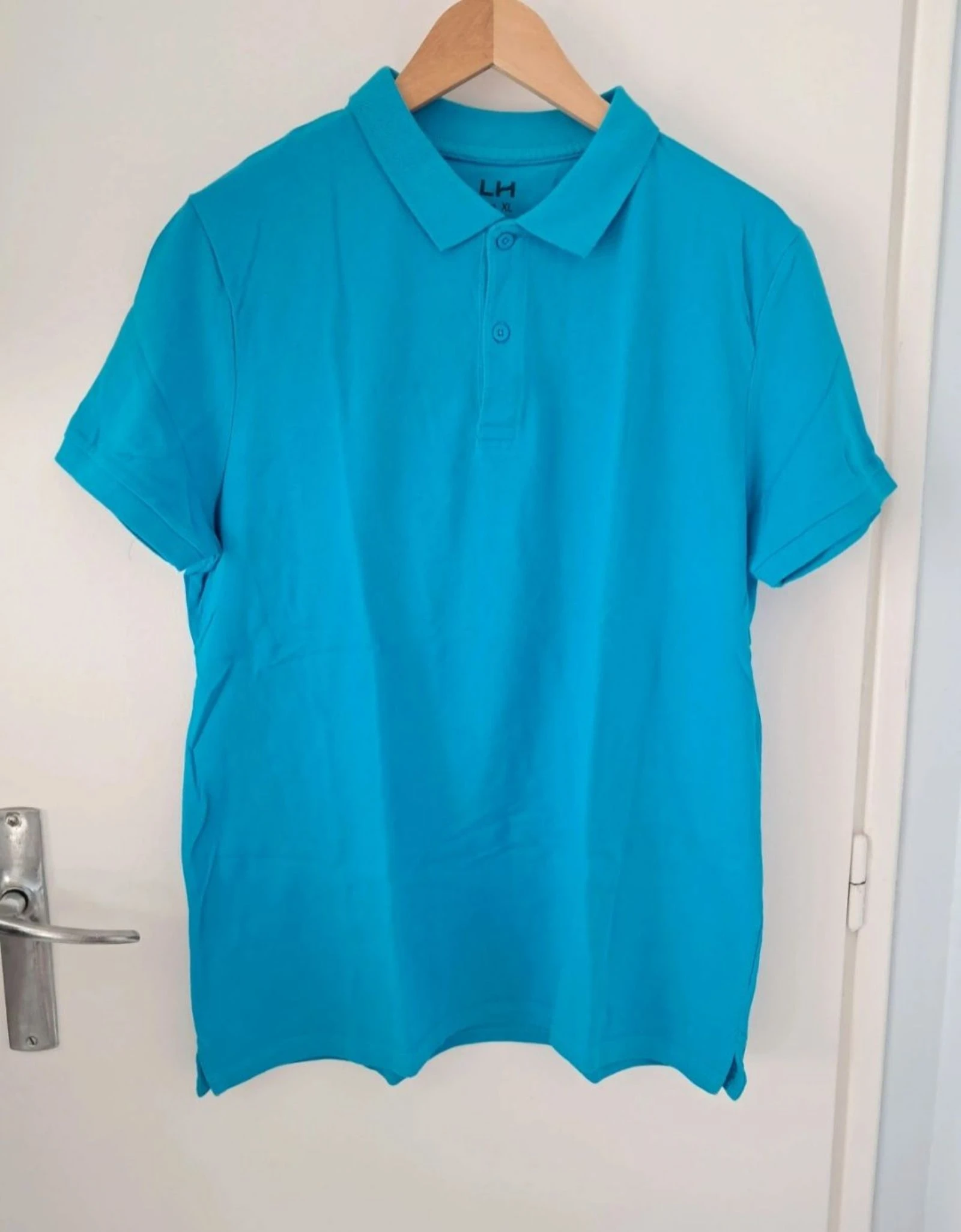 Polo manche courte taille XL turquoise unis